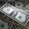 💵 Dólar fecha quase estável